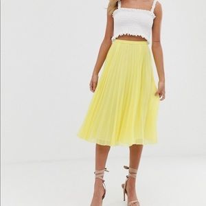 Yellow pleated midi skirt
